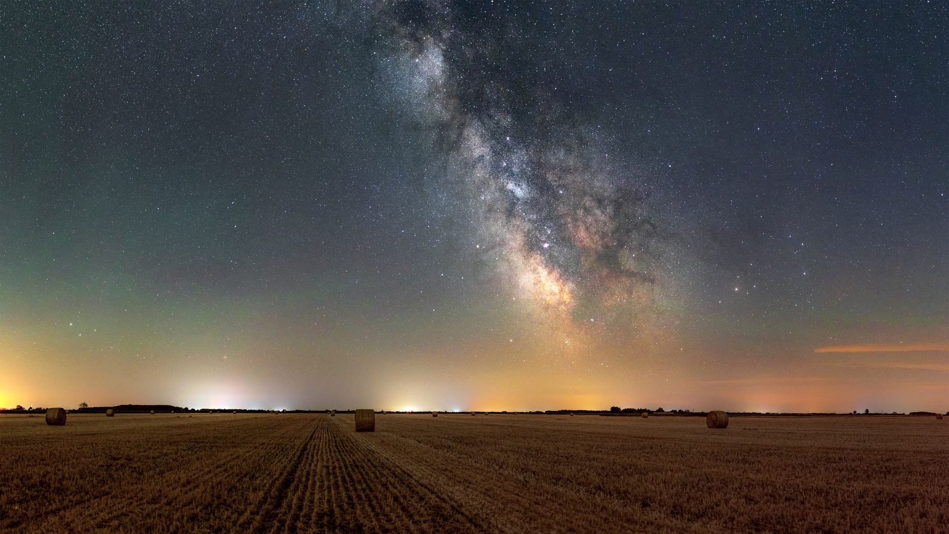 Milky Way over an open field at night